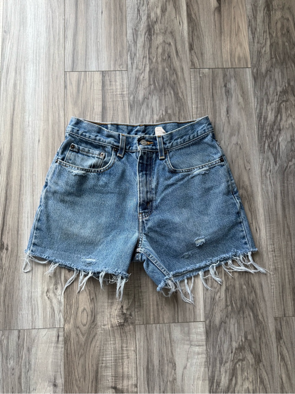 Vintage Levi’s High-Waist Distressed 550 Denim Cutoff Shorts